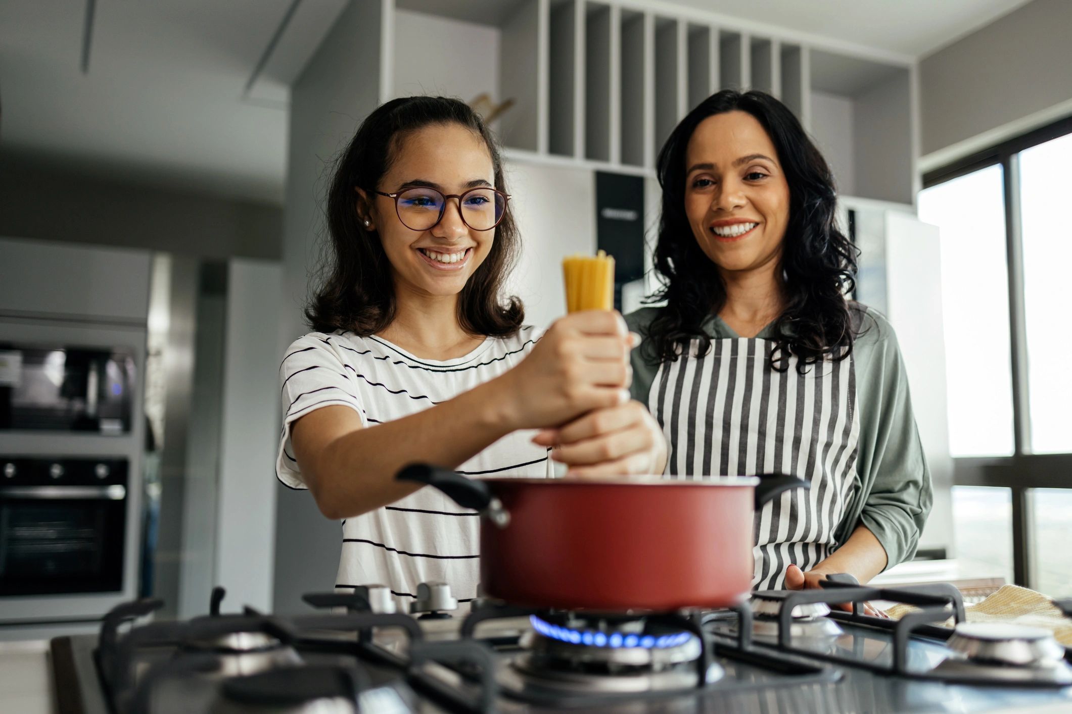family cooking kitchen warm food