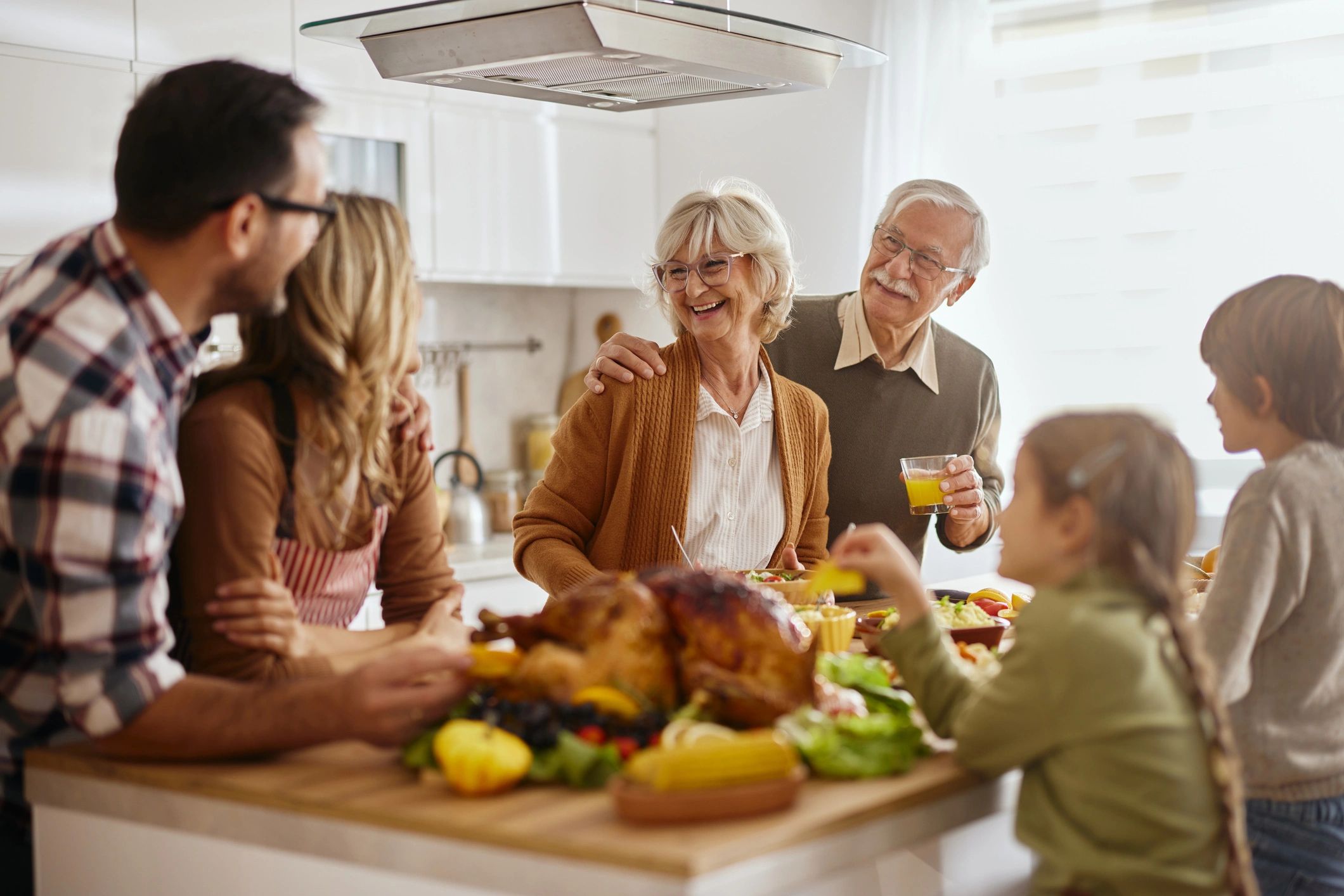 happy multigenerational family at home kitchen